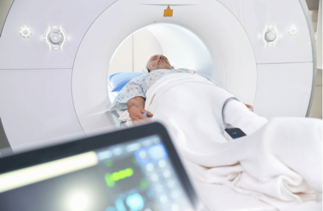 Male Patient Entering Hospital MRI Scanning Machine