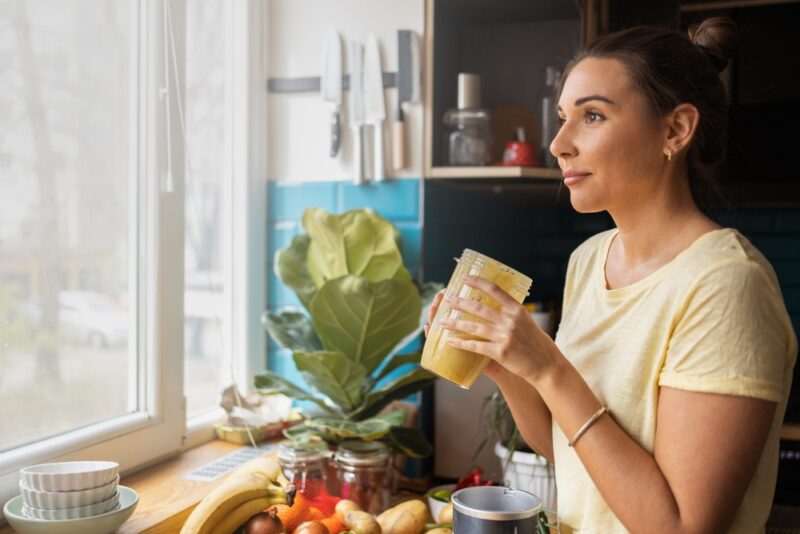Woman drinking a healthy smoothy who has prediabetes in Show Low, AZ